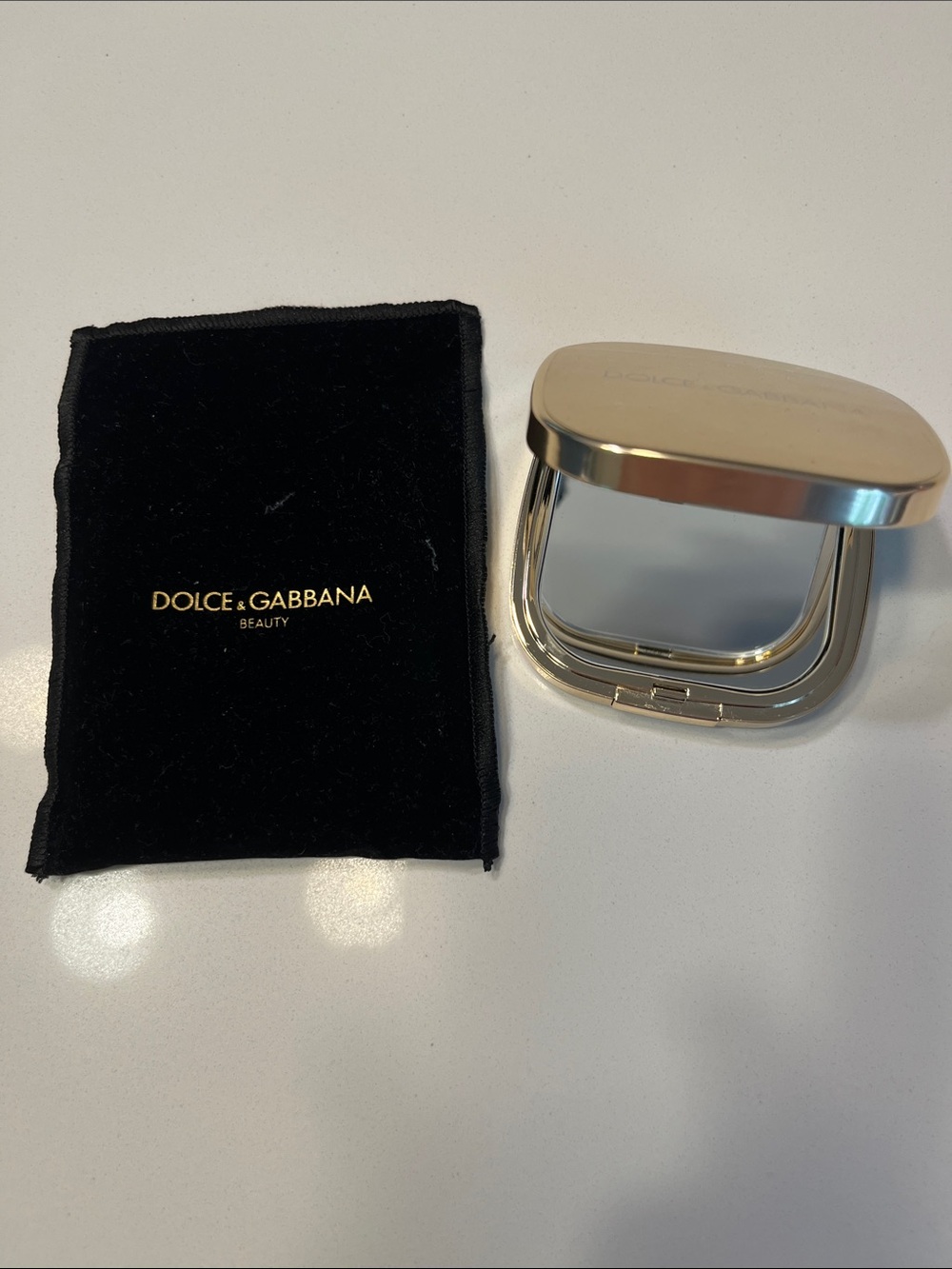 Dolce & Gabbana magnifying gold Compact mirror.. used once